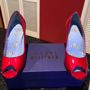 Women’s Stuart Weitzman red metallic shoes. 8M